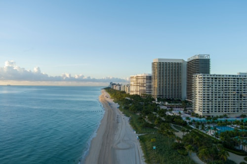 luxury hotels and condos at sunset on bal harbour beach